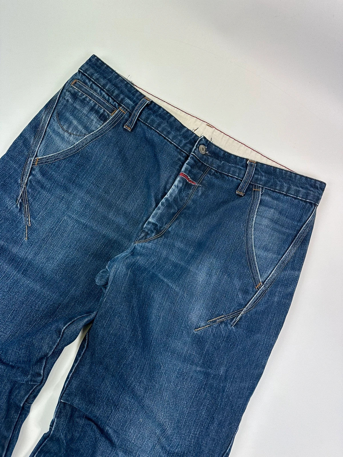 Marithé François Girbaud blue baggy jeans with wide legs and vintage 90s style.