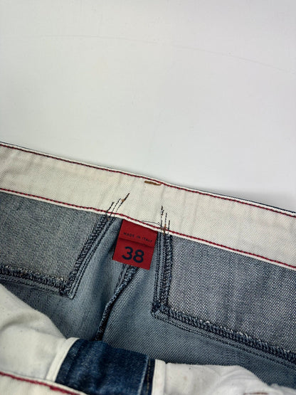 Marithé François Girbaud blue baggy jeans with wide legs and vintage 90s style.