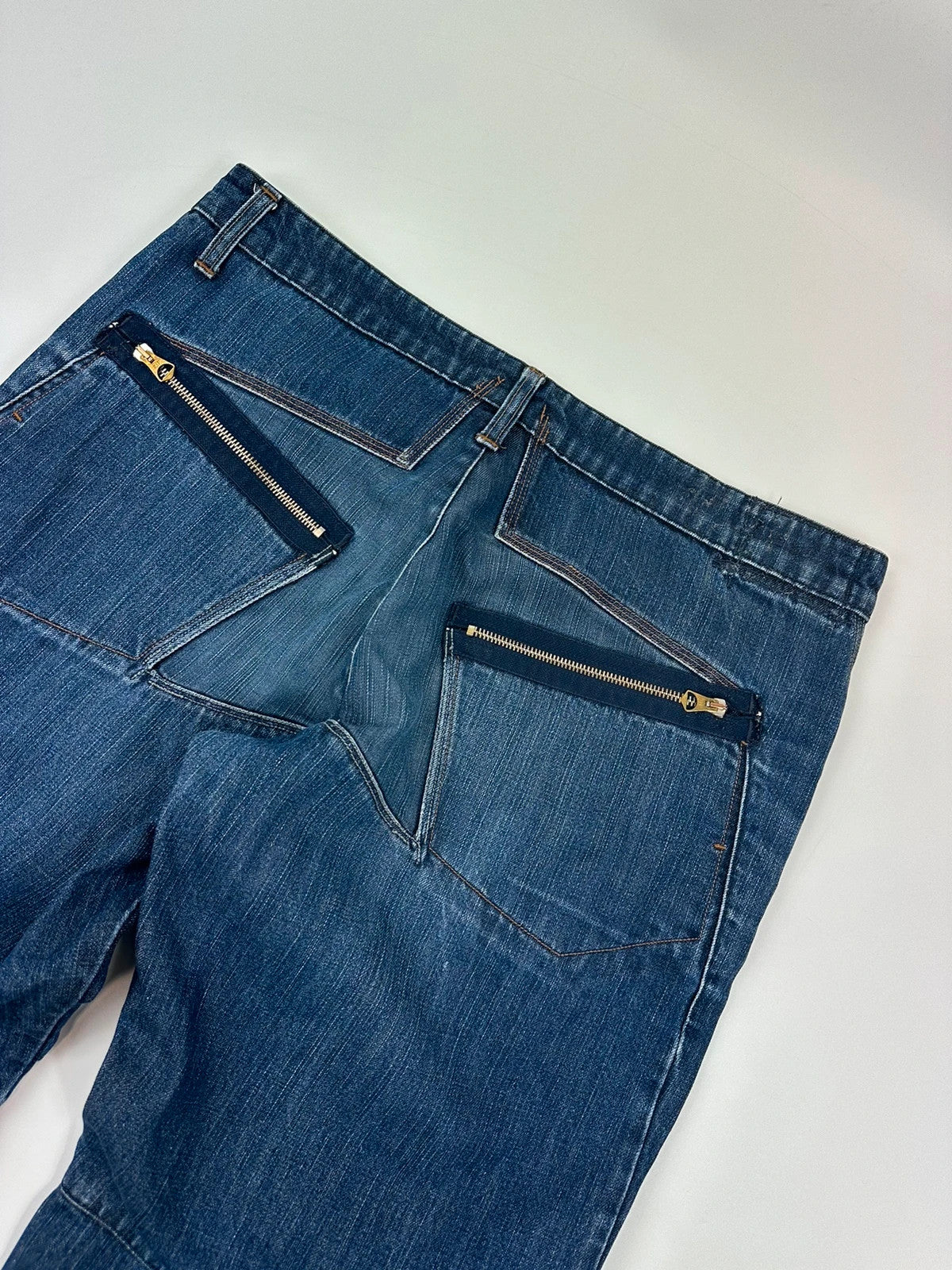 Marithé François Girbaud blue baggy jeans with wide legs and vintage 90s style.