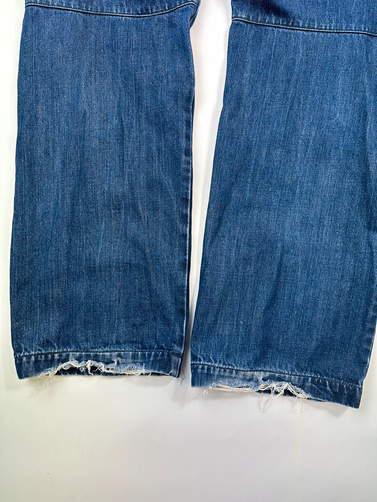 Marithé François Girbaud blue baggy jeans with wide legs and vintage 90s style.