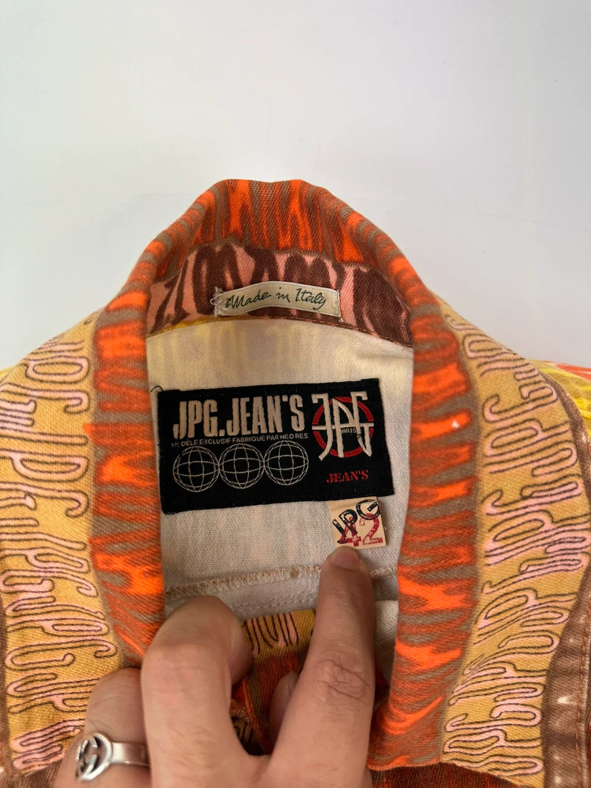 Jean-Paul Gaultier orange red monogram short sleeve shirt and denim pants set.