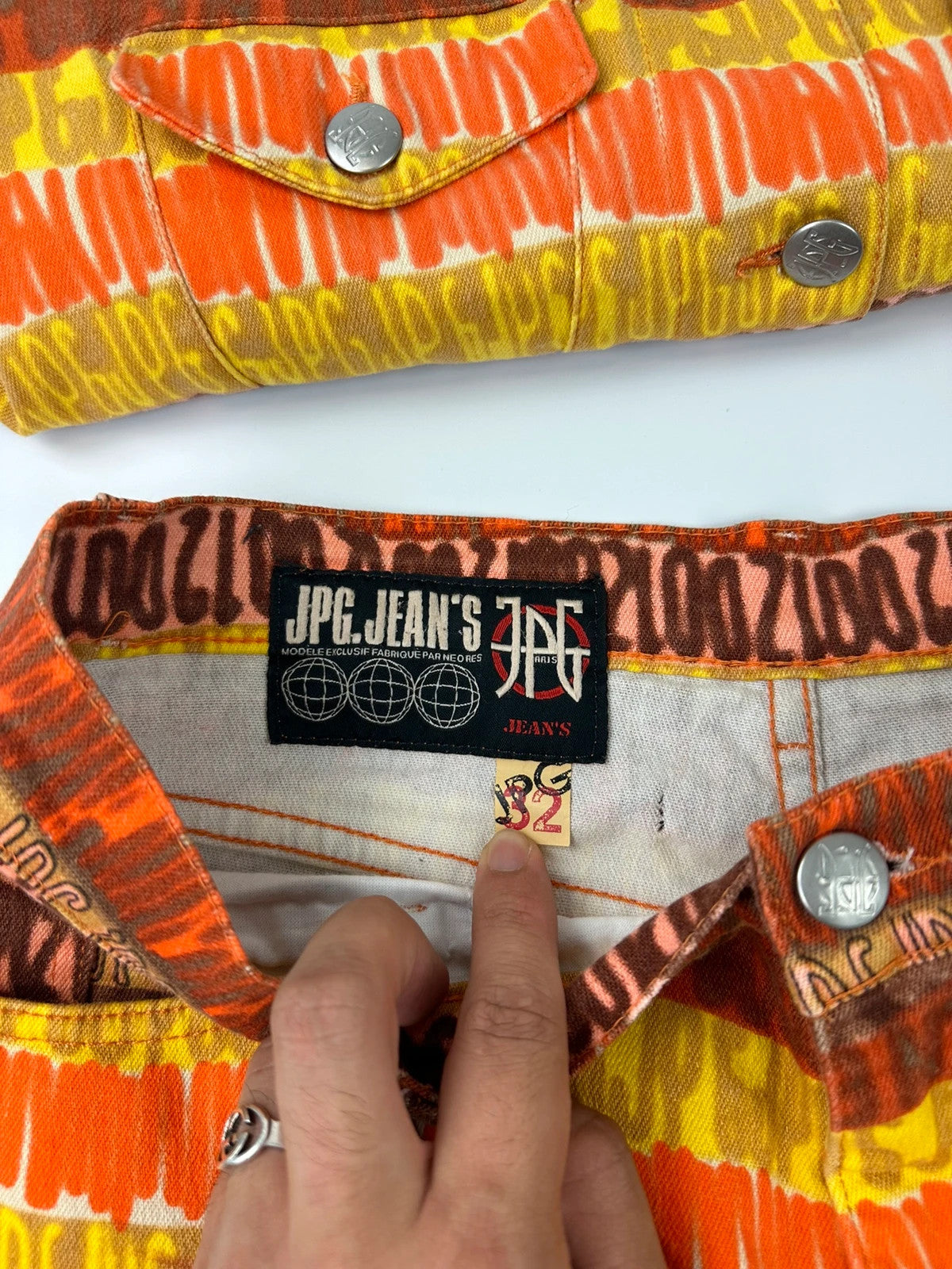 Jean-Paul Gaultier orange red monogram short sleeve shirt and denim pants set.