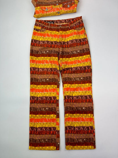 Jean-Paul Gaultier orange red monogram short sleeve shirt and denim pants set.