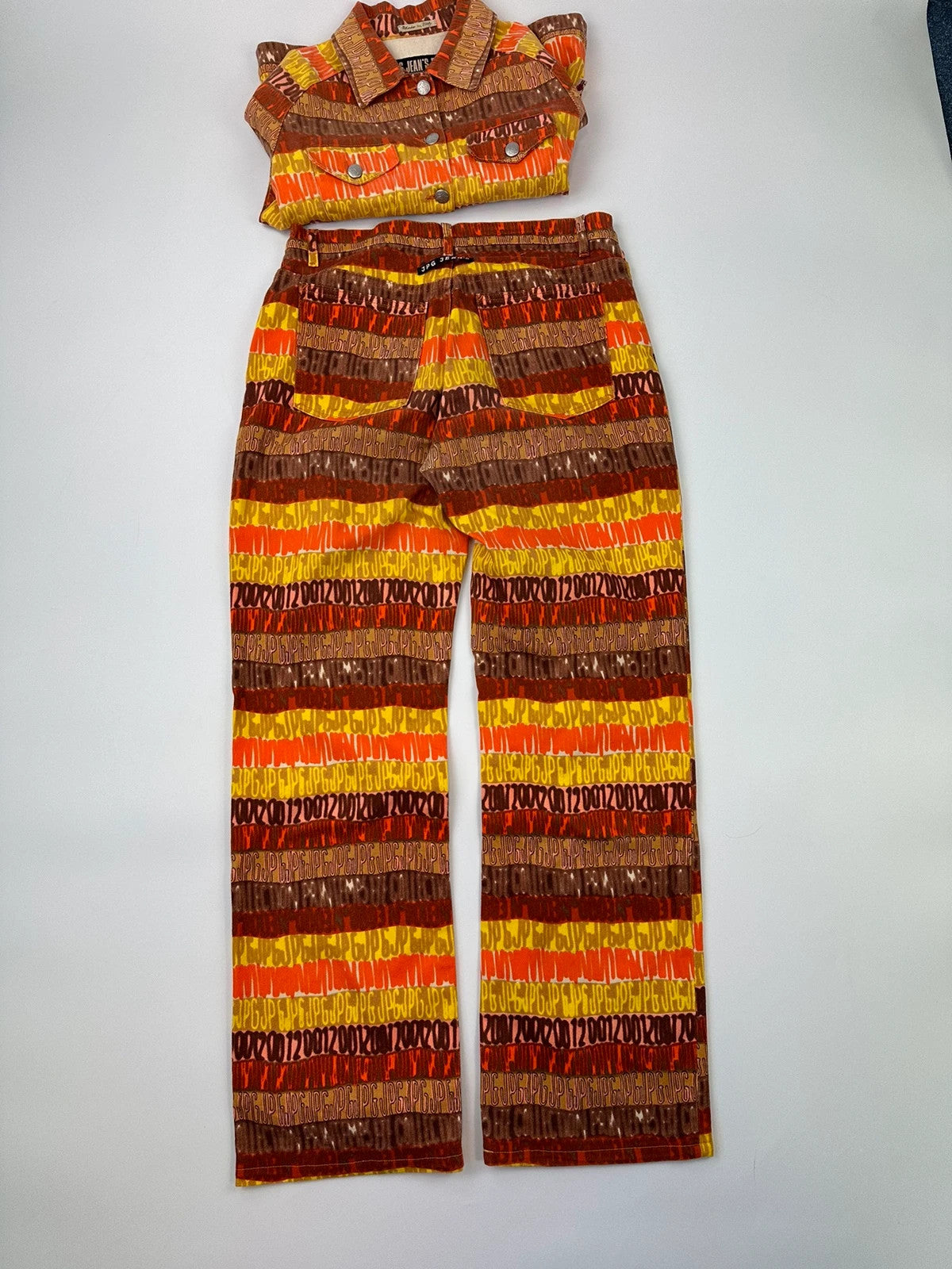 Jean-Paul Gaultier orange red monogram short sleeve shirt and denim pants set.