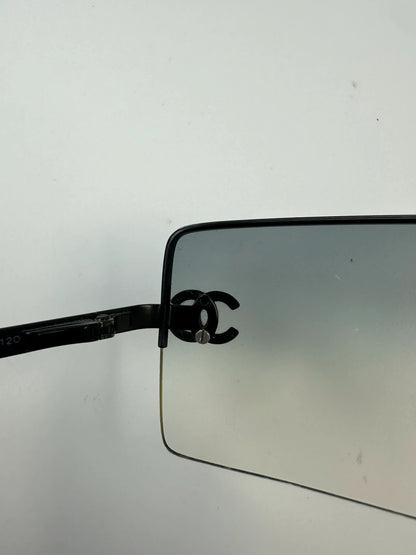 Chanel black and blue rimless sunglasses with double CC logo and strass details.