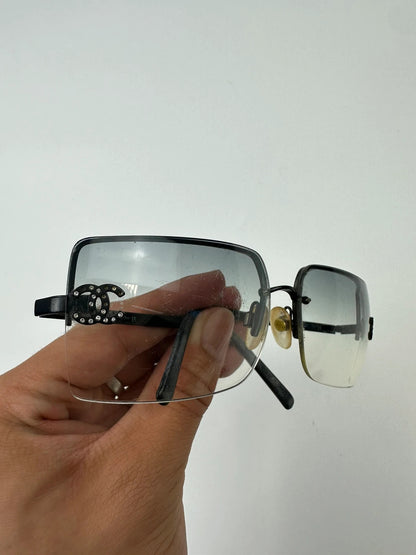Chanel black and blue rimless sunglasses with double CC logo and strass details.