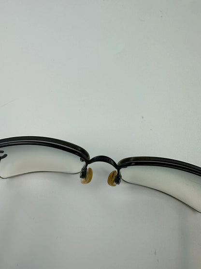 Chanel black and blue rimless sunglasses with double CC logo and strass details.