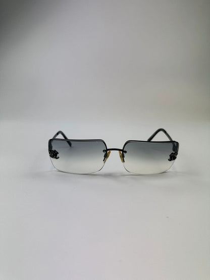 Chanel black and blue rimless sunglasses with double CC logo and strass details.