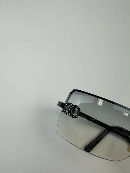 Chanel black and blue rimless sunglasses with double CC logo and strass details.