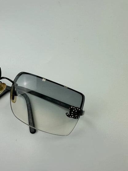 Chanel black and blue rimless sunglasses with double CC logo and strass details.