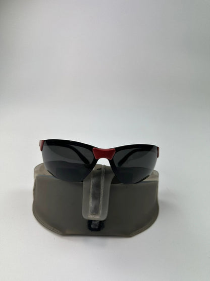 Prada Sport red and black sunglasses with titanium frame and black lenses.