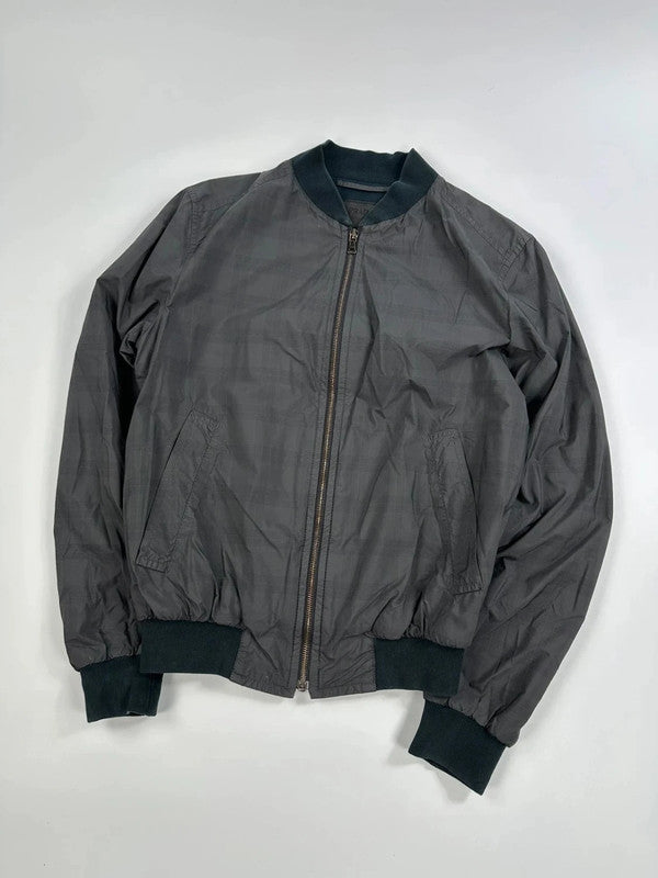 Prada bomber jacket black and grey checkered nylon with logo details.