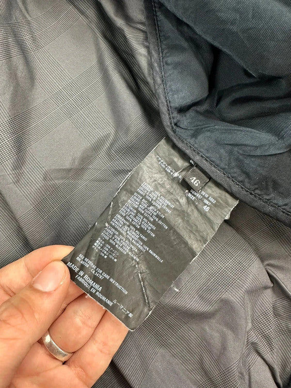 Prada bomber jacket black and grey checkered nylon with logo details.