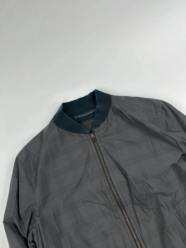 Prada bomber jacket black and grey checkered nylon with logo details.