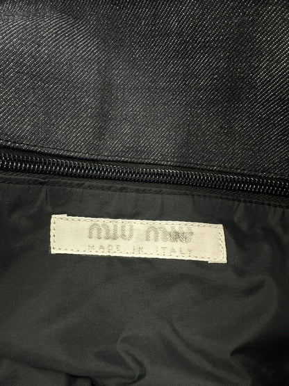 Miu Miu 90s denim crossbody sling bag in black and grey with logo detail.