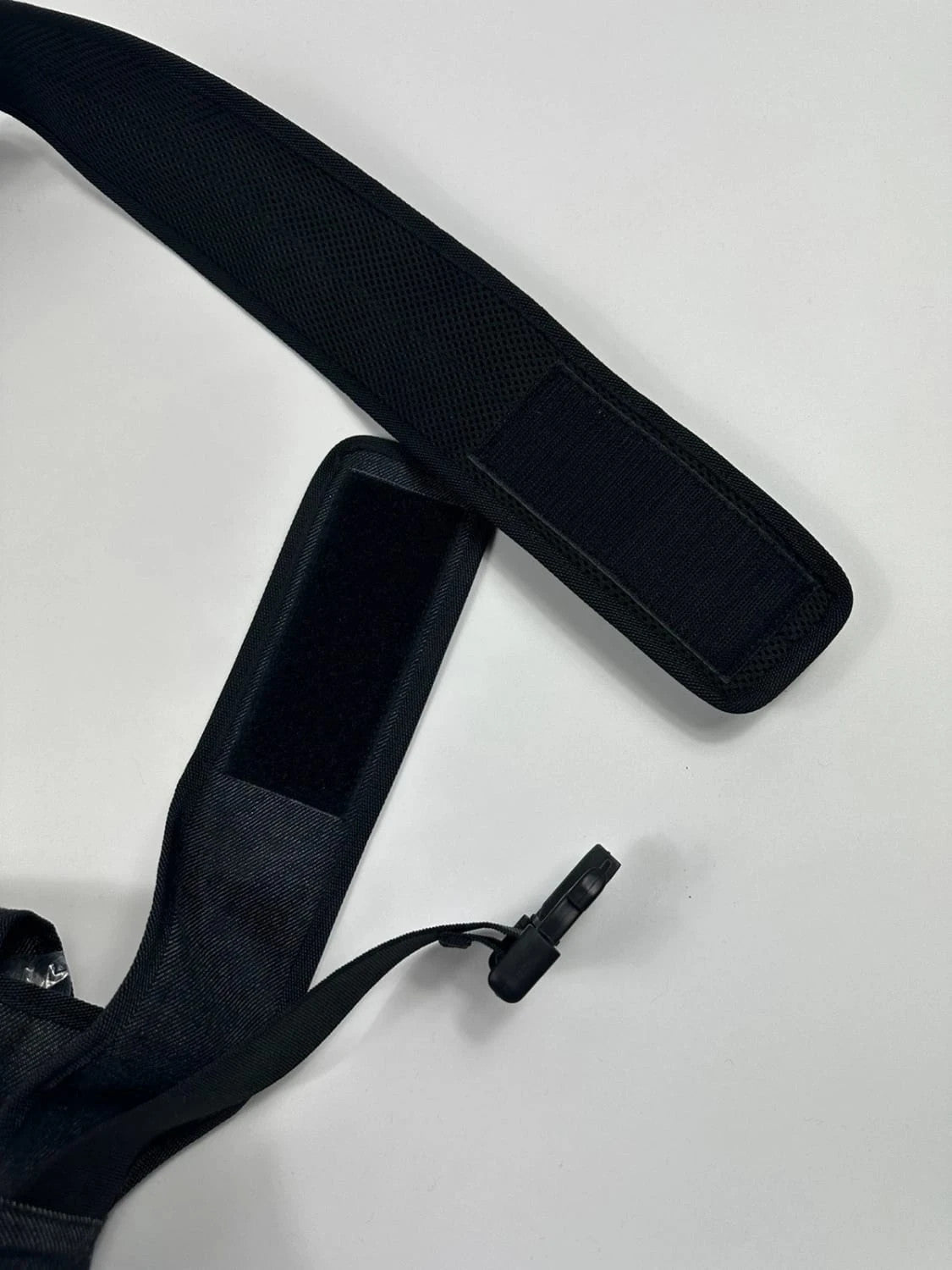 Miu Miu 90s denim crossbody sling bag in black and grey with logo detail.