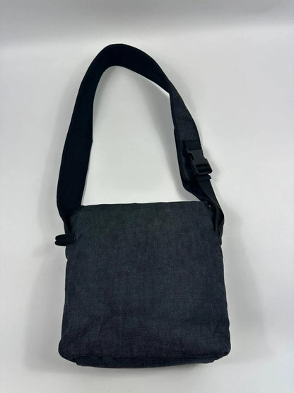 Miu Miu 90s denim crossbody sling bag in black and grey with logo detail.