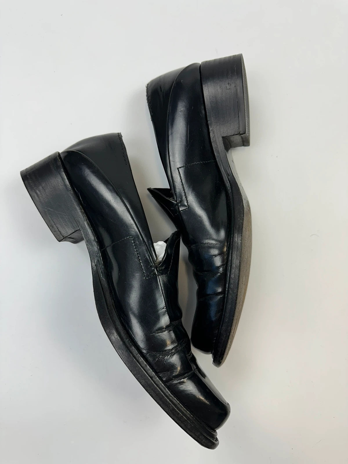 Prada black patent leather loafers with pointy toe and vintage 90's design.