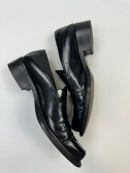 Prada black patent leather loafers with pointy toe and vintage 90's design.