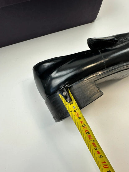 Prada black patent leather loafers with pointy toe and vintage 90's design.