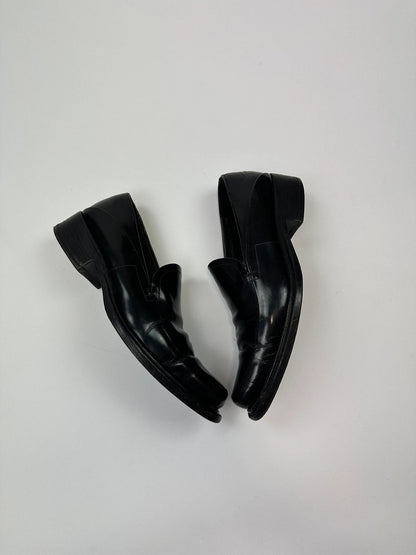 Prada black patent leather loafers with pointy toe and vintage 90's design.