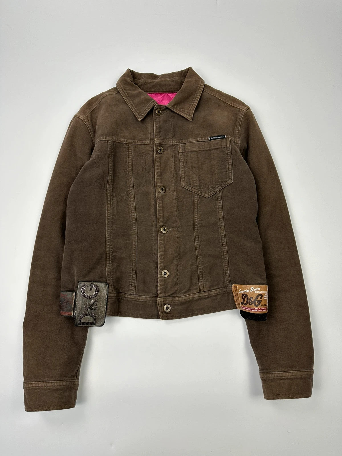 Dolce & Gabbana brown jacket with patch tags and vintage 2003 runway details.