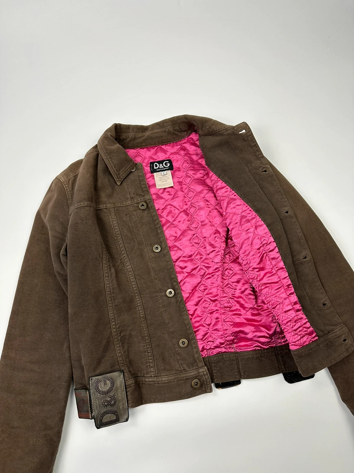 Dolce & Gabbana brown jacket with patch tags and vintage 2003 runway details.