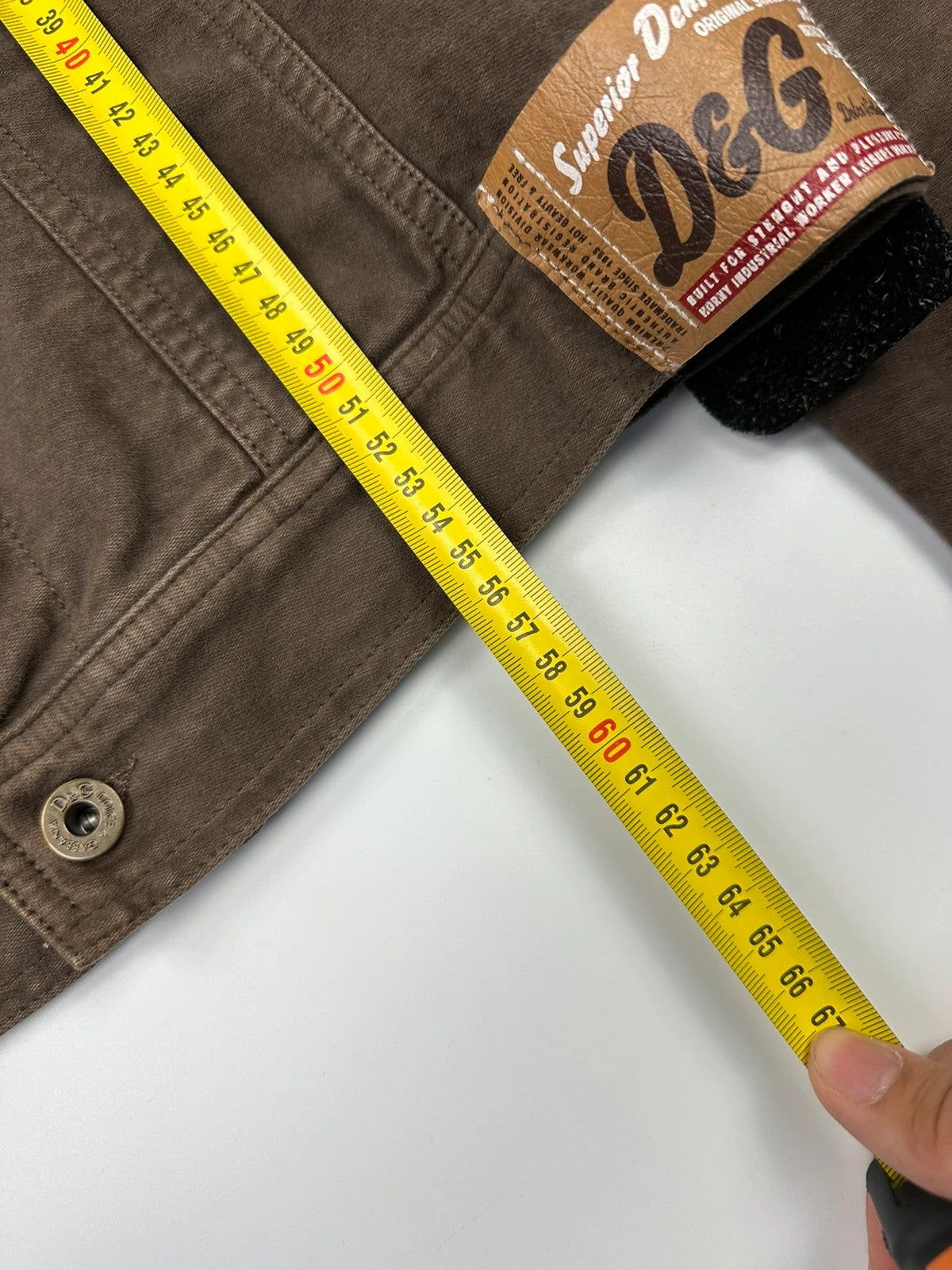 Dolce & Gabbana brown jacket with patch tags and vintage 2003 runway details.
