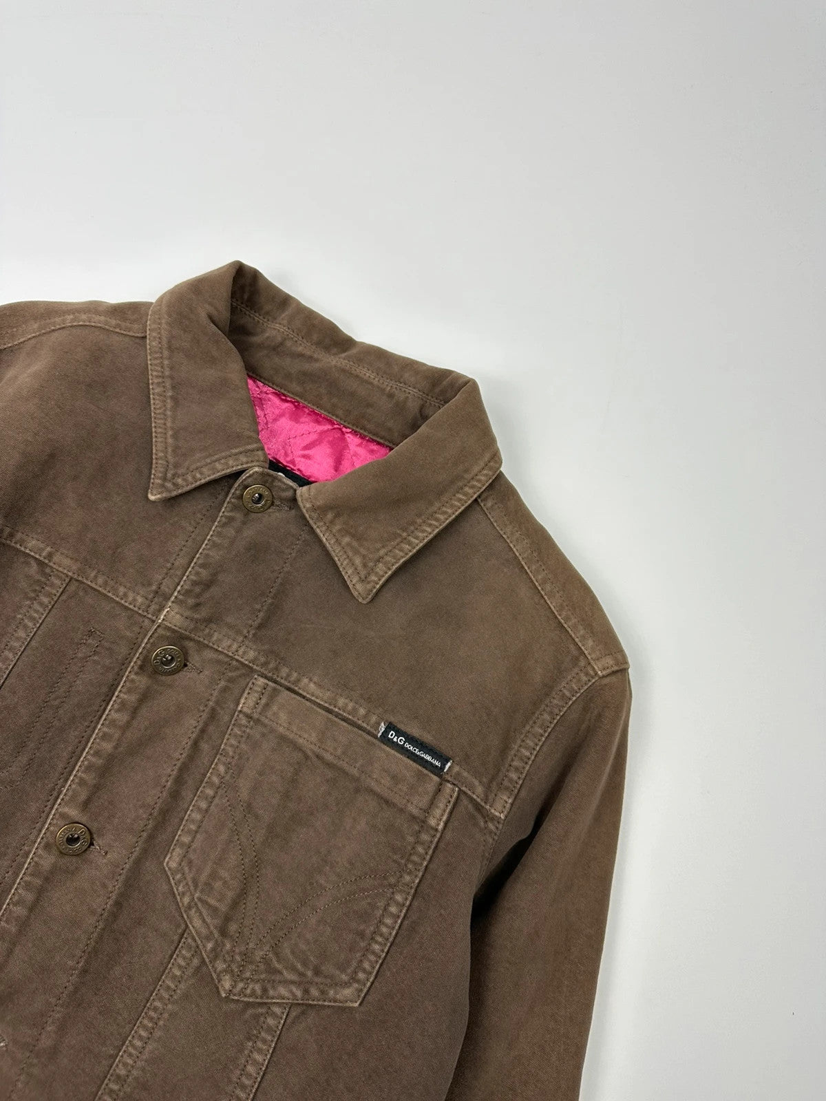 Dolce & Gabbana brown jacket with patch tags and vintage 2003 runway details.
