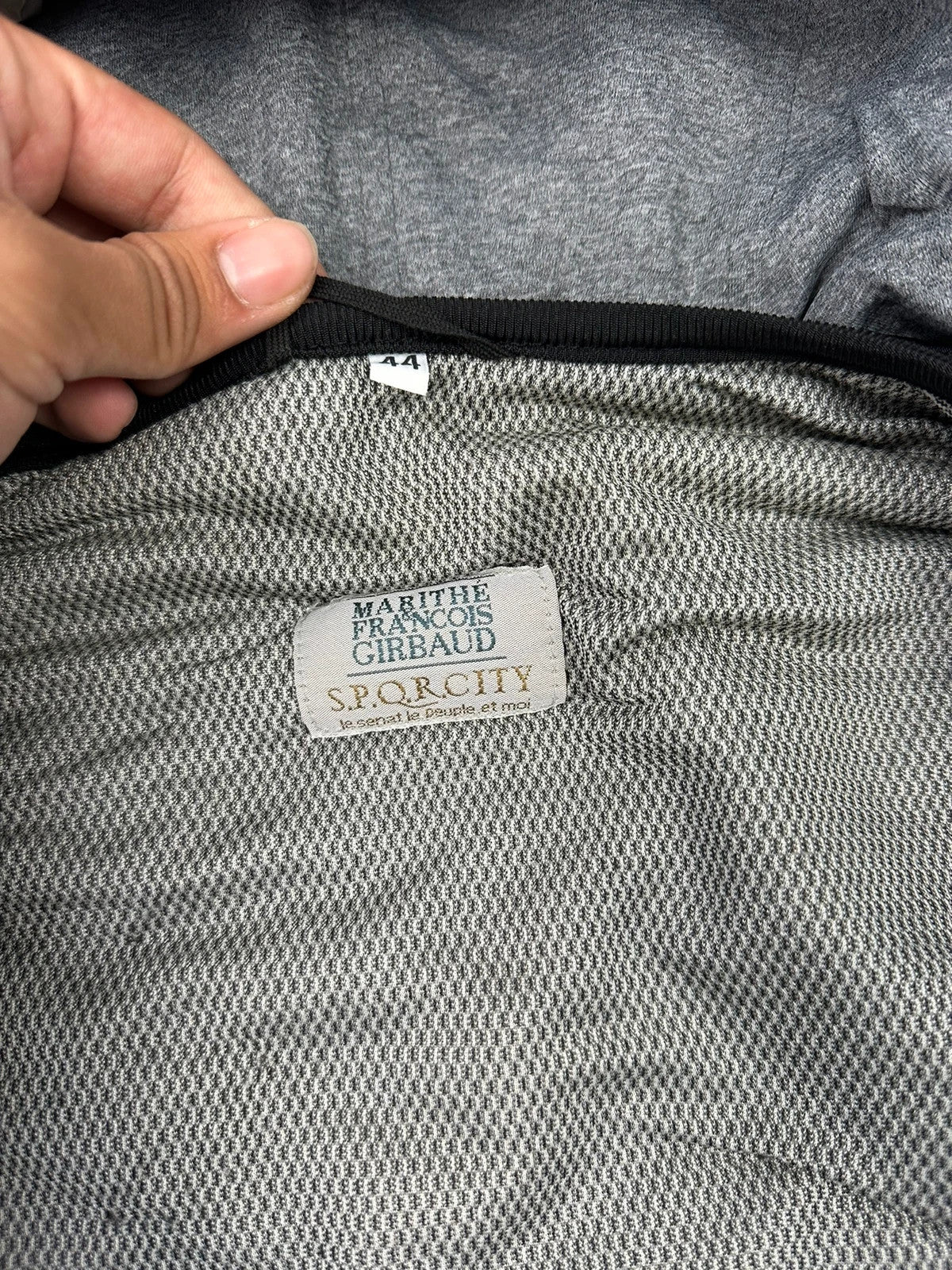 Marithé François Girbaud 80s puffy hooded jacket black and grey with logo details.