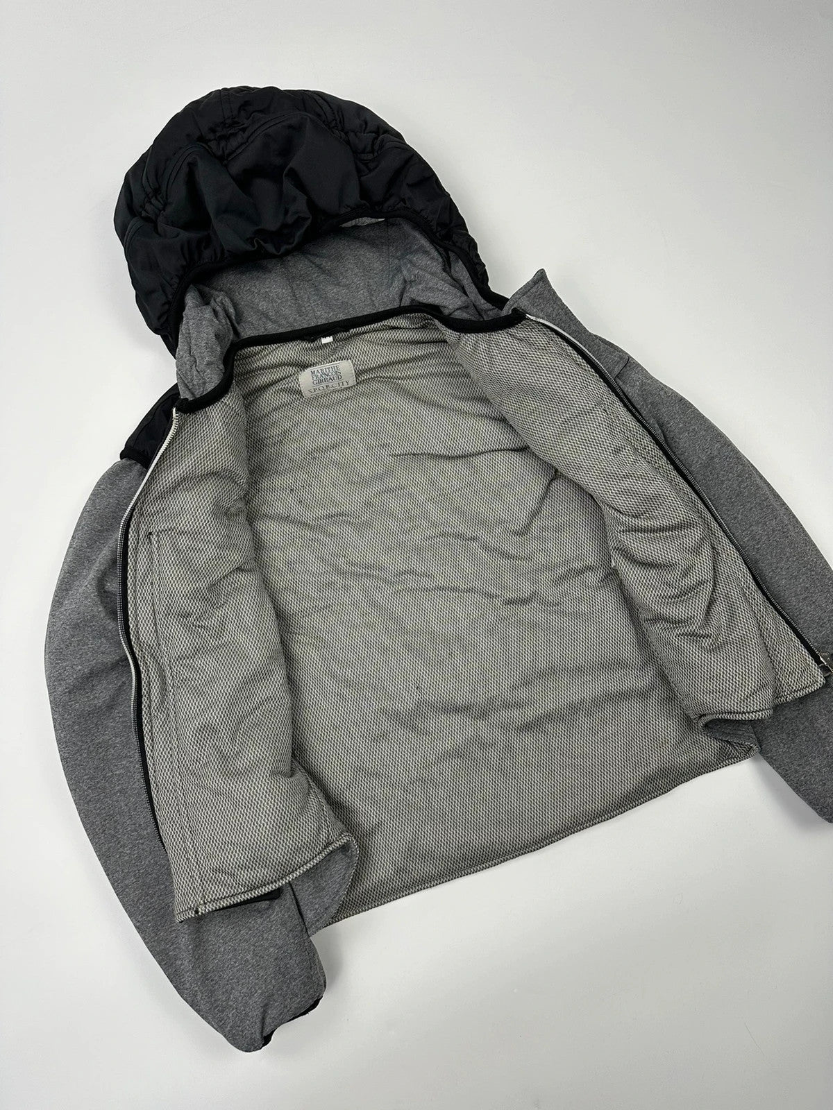 Marithé François Girbaud 80s puffy hooded jacket black and grey with logo details.