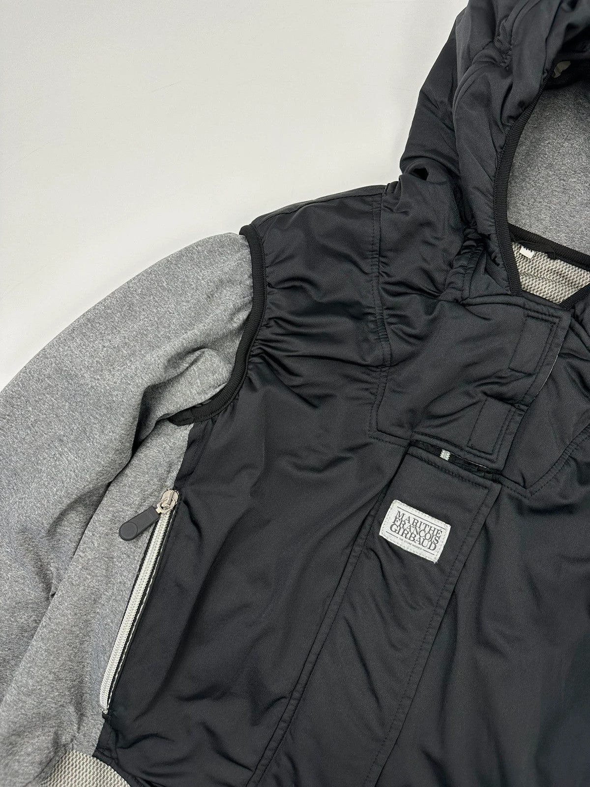 Marithé François Girbaud 80s puffy hooded jacket black and grey with logo details.