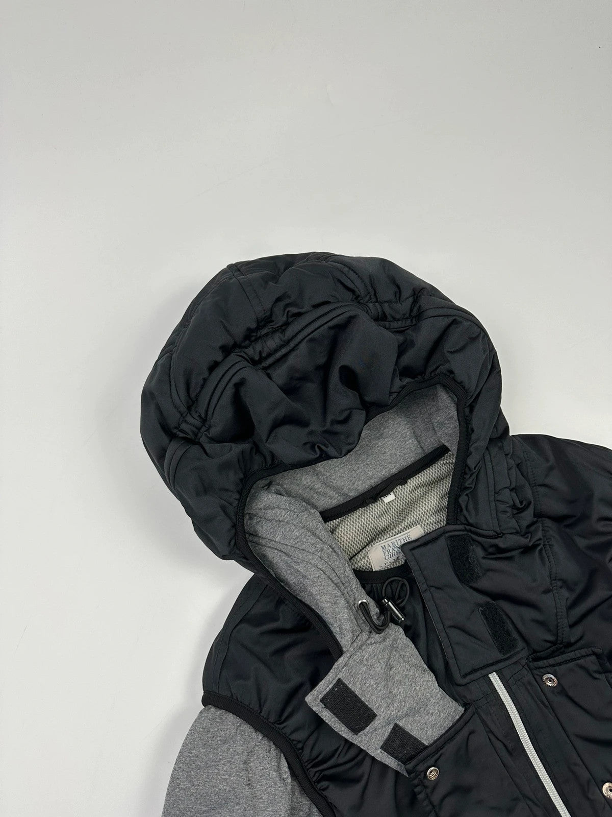 Marithé François Girbaud 80s puffy hooded jacket black and grey with logo details.