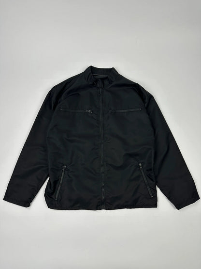 Marithé François Girbaud black nylon crop jacket with open back detail and vintage 90's style.