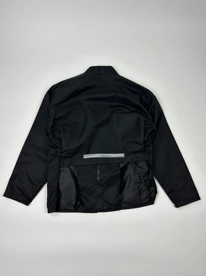 Marithé François Girbaud black nylon crop jacket with open back detail and vintage 90's style.