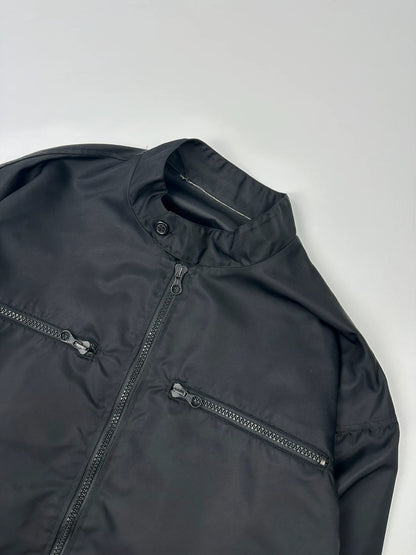 Marithé François Girbaud black nylon crop jacket with open back detail and vintage 90's style.