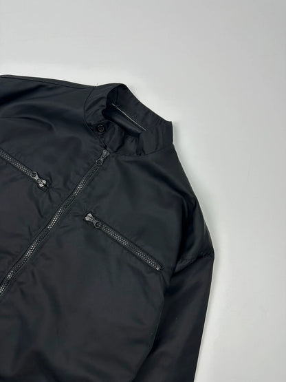 Marithé François Girbaud black nylon crop jacket with open back detail and vintage 90's style.