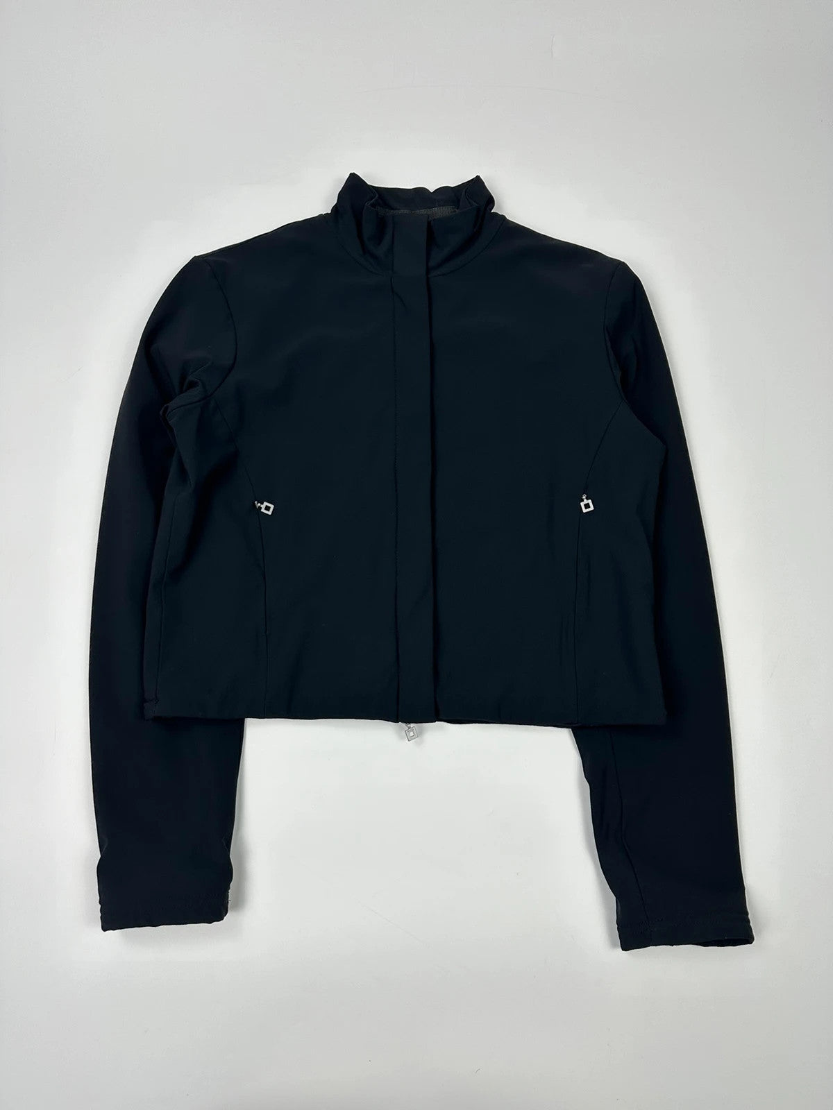 Marithé François Girbaud navy blue padded jacket with logo detailing and minimalist design.