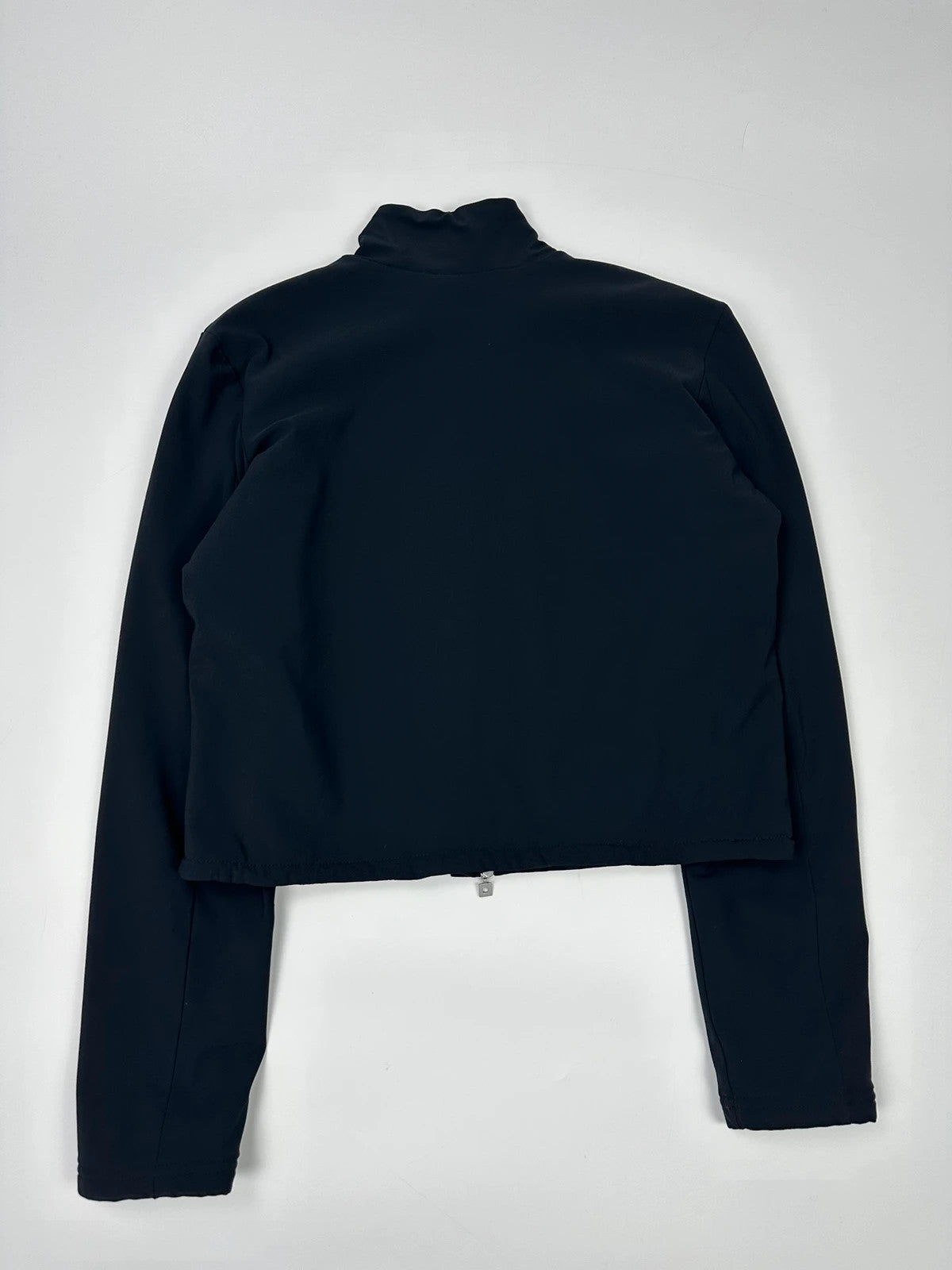 Marithé François Girbaud navy blue padded jacket with logo detailing and minimalist design.