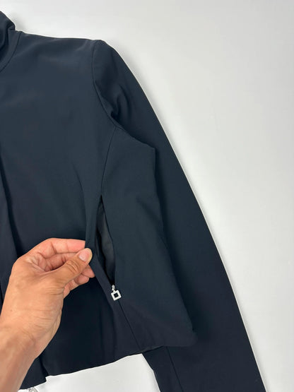 Marithé François Girbaud navy blue padded jacket with logo detailing and minimalist design.