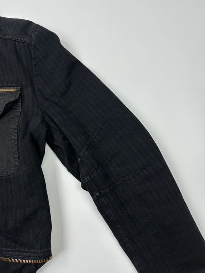 Dolce & Gabbana black denim jacket with detachable features and logo detailing.