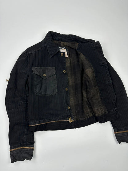 Dolce & Gabbana black denim jacket with detachable features and logo detailing.