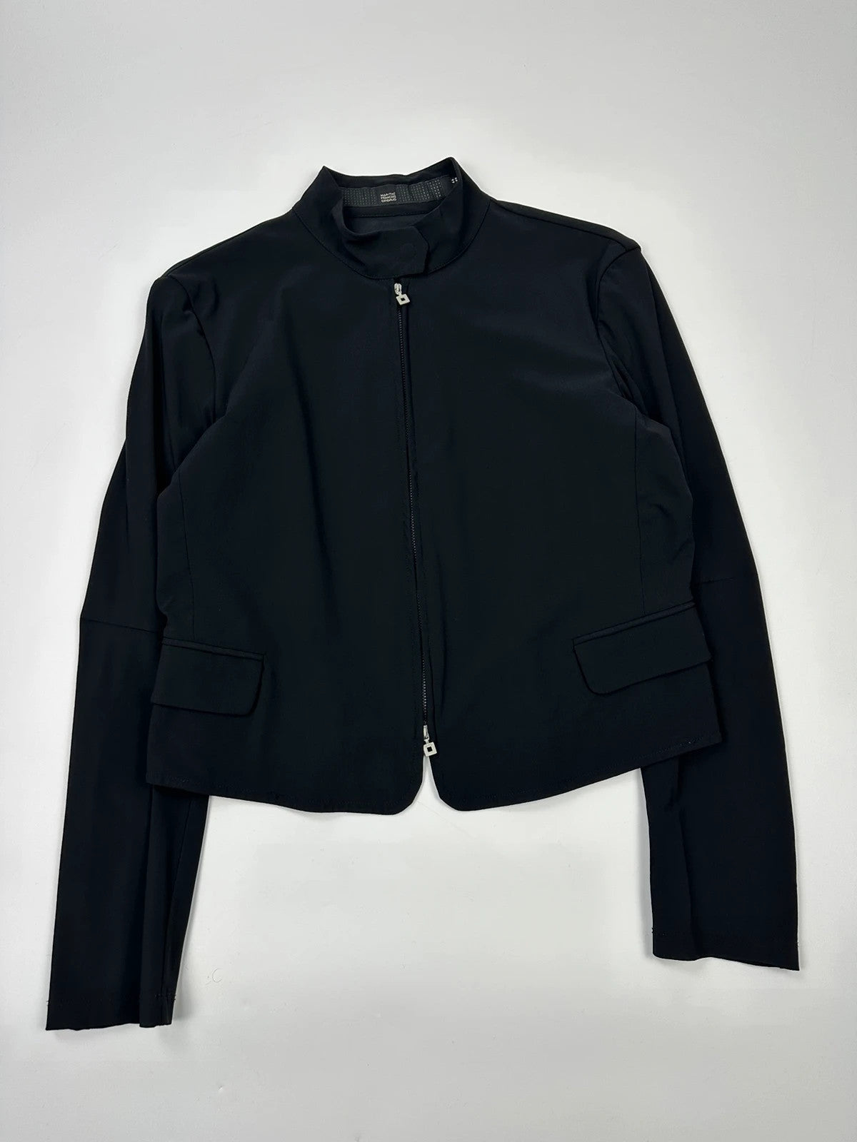 Marithé François Girbaud black fitted jacket with subtle logo detail and sleek design.