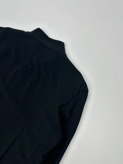 Marithé François Girbaud black fitted jacket with subtle logo detail and sleek design.