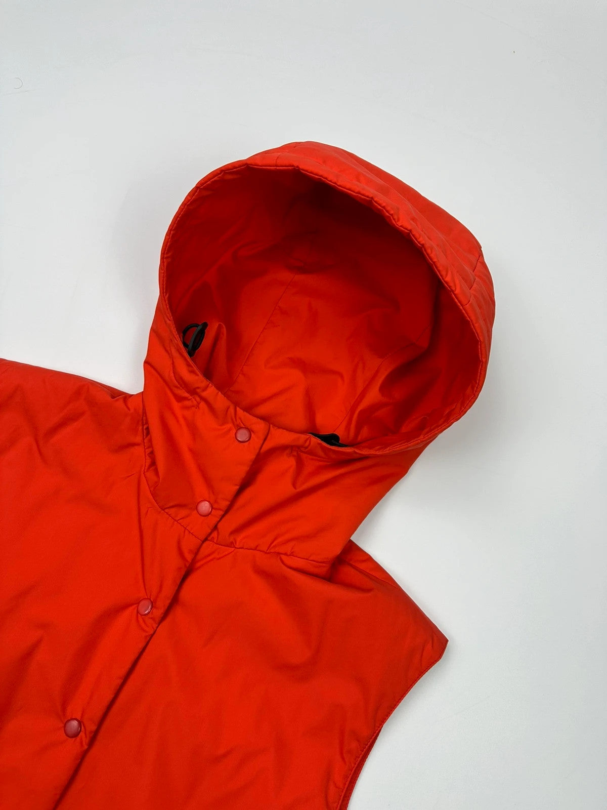 Prada orange nylon sleeveless vest jacket with logo detail from SS1999 collection.