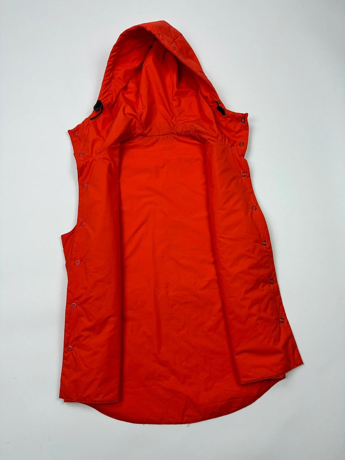 Prada orange nylon sleeveless vest jacket with logo detail from SS1999 collection.