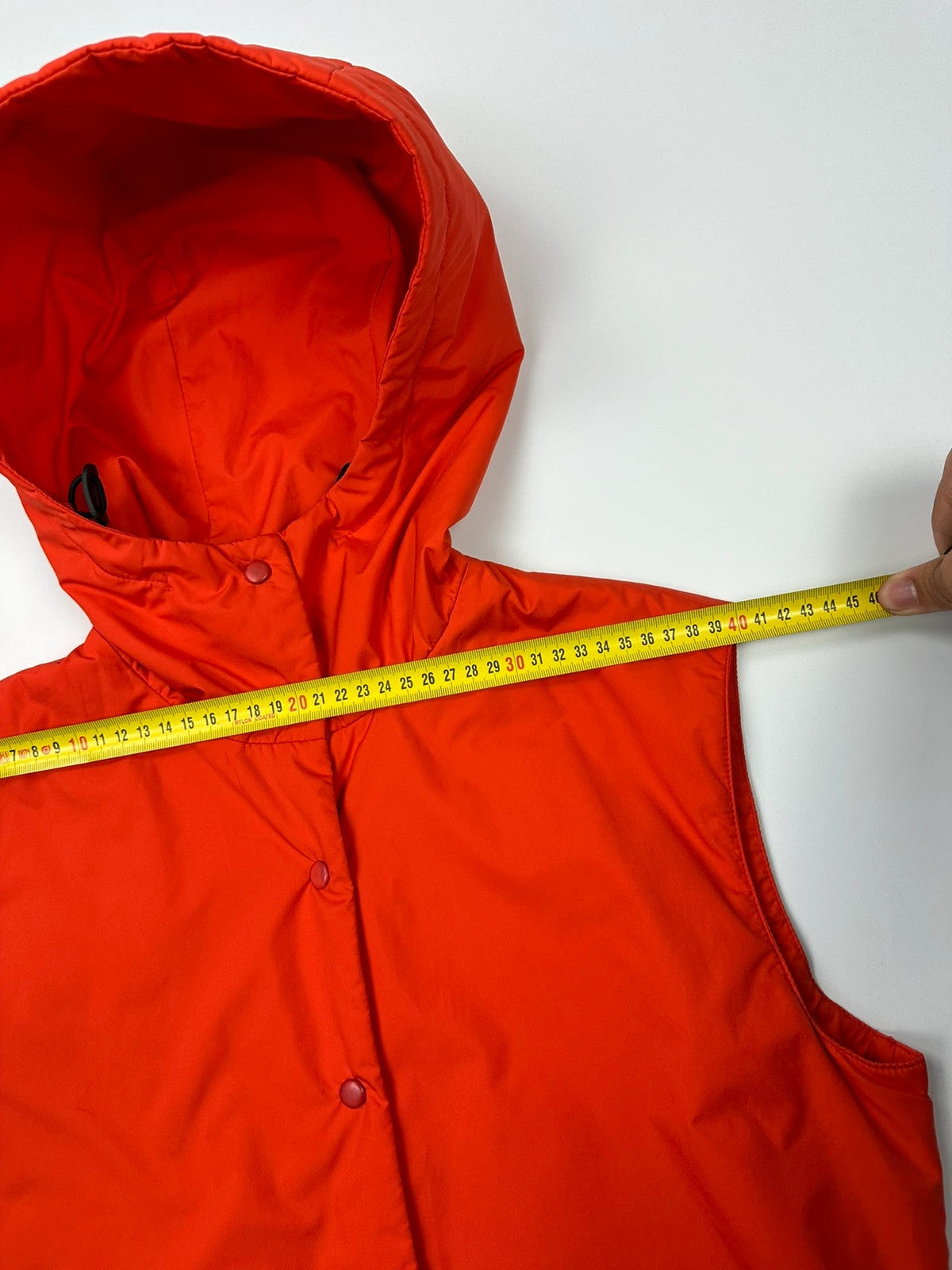 Prada orange nylon sleeveless vest jacket with logo detail from SS1999 collection.
