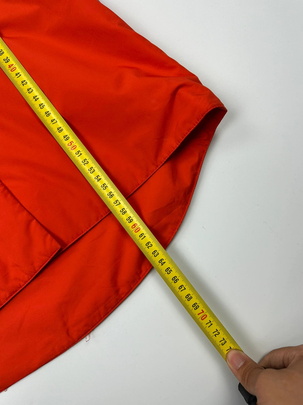 Prada orange nylon sleeveless vest jacket with logo detail from SS1999 collection.