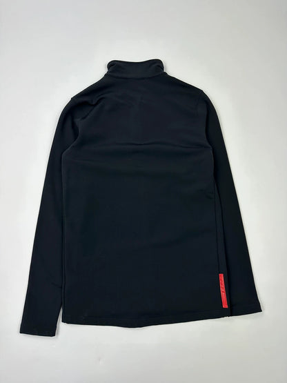 Prada black zip-up jacket featuring fleece material and iconic logo detail.