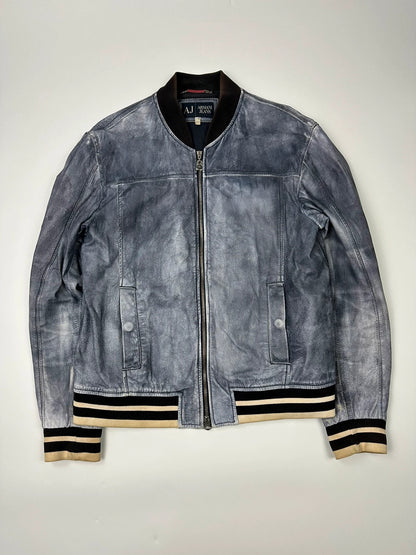 Armani blue and purple bomber jacket, eroded leather, vintage 2000s style.